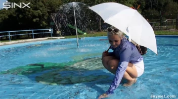 Playful Blonde Gets Drenched Under Water Fountain Screencap 16 on sinx.preview.netperv.com