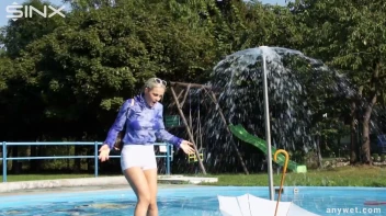 Playful Blonde Gets Drenched Under Water Fountain Screencap 18 on sinx.preview.netperv.com