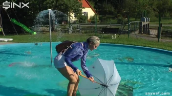 Playful Blonde Gets Drenched Under Water Fountain Screencap 20 on sinx.preview.netperv.com