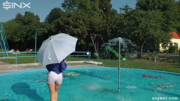 Playful Blonde Gets Drenched Under Water Fountain Screencap 29 on sinx.preview.netperv.com