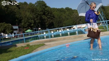 Playful Blonde Gets Drenched Under Water Fountain Screencap 38 on sinx.preview.netperv.com