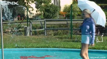 Playful Blonde Gets Drenched Under Water Fountain Screencap 4 on sinx.preview.netperv.com