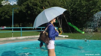 Playful Blonde Gets Drenched Under Water Fountain Screencap 40 on sinx.preview.netperv.com