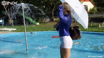 Playful Blonde Gets Drenched Under Water Fountain Screencap 43 on sinx.preview.netperv.com