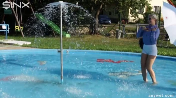 Playful Blonde Gets Drenched Under Water Fountain Screencap 5 on sinx.preview.netperv.com