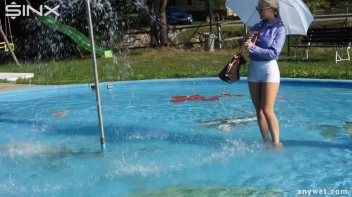 Playful Blonde Gets Drenched Under Water Fountain Screencap 7 on sinx.preview.netperv.com