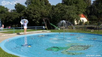 Playful Blonde Gets Drenched Under Water Fountain Screencap 1 on sinx.preview.netperv.com