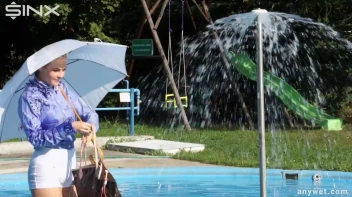 Playful Blonde Gets Drenched Under Water Fountain Screencap 12 on sinx.preview.netperv.com