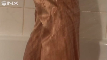 European Minx Showers In Clothes Screencap 4 on sinx.preview.netperv.com