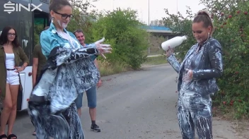 Bitchy Europeans Get Drenched In Milk Outside Screencap 16 on sinx.preview.netperv.com