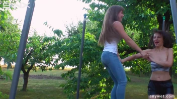 Cute Brunettes Get Drenched On Trampoline Screencap 13 on sinx.preview.netperv.com