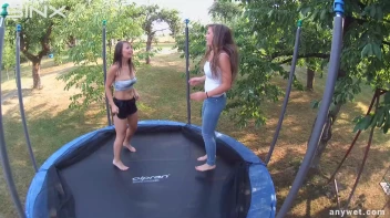 Cute Brunettes Get Drenched On Trampoline Screencap 17 on sinx.preview.netperv.com