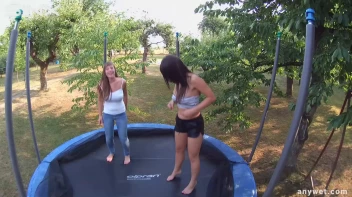 Cute Brunettes Get Drenched On Trampoline Screencap 19 on sinx.preview.netperv.com