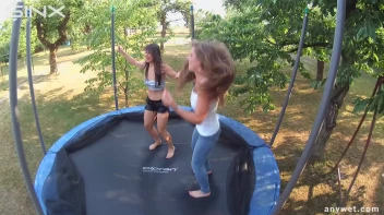 Cute Brunettes Get Drenched On Trampoline Screencap 25 on sinx.preview.netperv.com