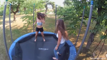 Cute Brunettes Get Drenched On Trampoline Screencap 3 on sinx.preview.netperv.com