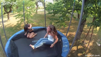 Cute Brunettes Get Drenched On Trampoline Screencap 35 on sinx.preview.netperv.com
