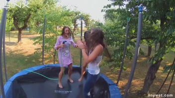 Cute Brunettes Get Drenched On Trampoline Screencap 48 on sinx.preview.netperv.com