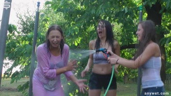 Cute Brunettes Get Drenched On Trampoline Screencap 51 on sinx.preview.netperv.com