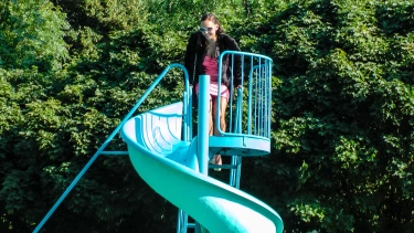 Latest deal - Waterpark Fun For Fully Clothed Brunette Babe