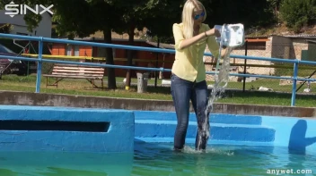 Sexy Blonde Swims And Splashes In Outdoor Pool Screencap 4 on sinx.preview.netperv.com