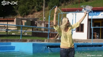 Sexy Blonde Swims And Splashes In Outdoor Pool Screencap 9 on sinx.preview.netperv.com