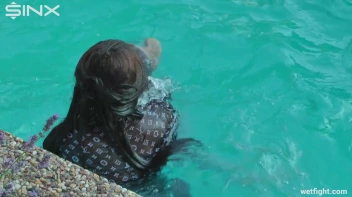 Three wild girls in pool cat fight Screencap 16 on sinx.preview.netperv.com