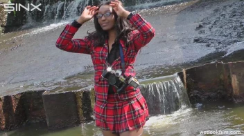 Ebony Babe Goes For A Swim In School Uniform Screencap 19 on sinx.preview.netperv.com