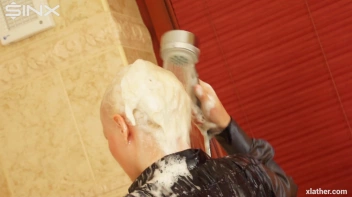 Clothed Sexy Blonde Lathers Up Her Hair Screencap 39 on sinx.preview.netperv.com