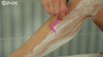 Fully Clothed Blonde Shaves Her Long Legs Screencap 17 on sinx.preview.netperv.com