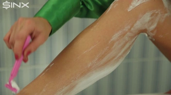 Fully Clothed Blonde Shaves Her Long Legs Screencap 18 on sinx.preview.netperv.com