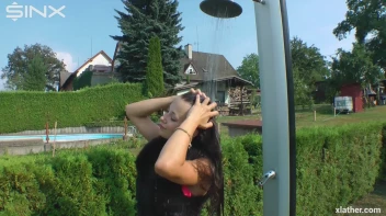 Clothed Hair Washing In Outdoor Shower Screencap 5 on sinx.preview.netperv.com