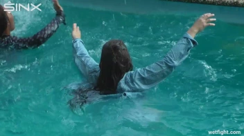 Three wild girls in pool cat fight Screencap 22 on sinx.preview.netperv.com