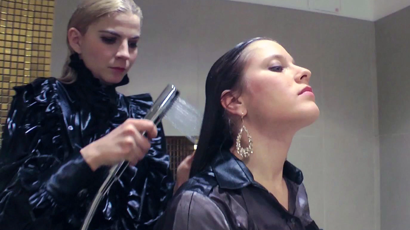 Blonde and brunette shampooing one another on sinx.preview.netperv.com