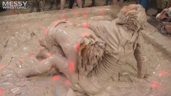 Messy Wrestling: Tattooed Beauty, Ripped Clothes & Lots Of Mud Covered Booby & Booty! Screencap 43 on sinx.preview.netperv.com