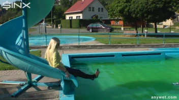 Sexy Blonde Swims And Splashes In Outdoor Pool Screencap 20 on sinx.preview.netperv.com