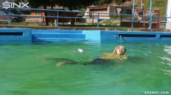 Sexy Blonde Swims And Splashes In Outdoor Pool Screencap 22 on sinx.preview.netperv.com