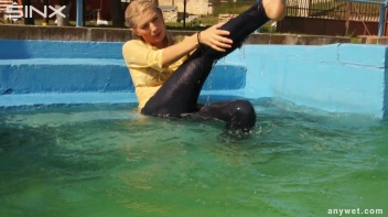 Sexy Blonde Swims And Splashes In Outdoor Pool Screencap 64 on sinx.preview.netperv.com