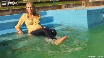 Sexy Blonde Swims And Splashes In Outdoor Pool Screencap 65 on sinx.preview.netperv.com