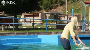 Sexy Blonde Swims And Splashes In Outdoor Pool Screencap 8 on sinx.preview.netperv.com