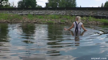 Seductive Blonde Smokes And Gets Drenched In Lake Screencap 25 on sinx.preview.netperv.com