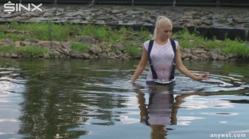 Seductive Blonde Smokes And Gets Drenched In Lake Screencap 26 on sinx.preview.netperv.com