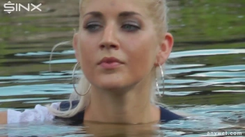 Seductive Blonde Smokes And Gets Drenched In Lake Screencap 32 on sinx.preview.netperv.com
