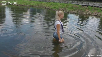 Seductive Blonde Smokes And Gets Drenched In Lake Screencap 20 on sinx.preview.netperv.com