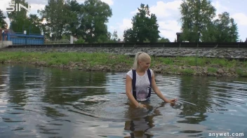 Seductive Blonde Smokes And Gets Drenched In Lake Screencap 22 on sinx.preview.netperv.com