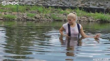 Seductive Blonde Smokes And Gets Drenched In Lake Screencap 27 on sinx.preview.netperv.com