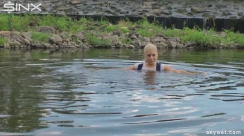 Seductive Blonde Smokes And Gets Drenched In Lake Screencap 34 on sinx.preview.netperv.com