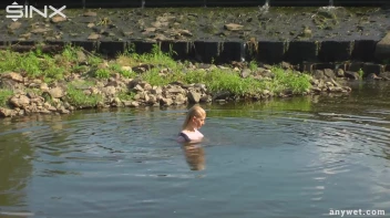 Seductive Blonde Smokes And Gets Drenched In Lake Screencap 48 on sinx.preview.netperv.com