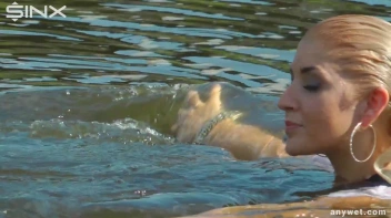 Seductive Blonde Smokes And Gets Drenched In Lake Screencap 56 on sinx.preview.netperv.com
