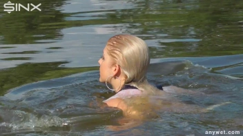 Seductive Blonde Smokes And Gets Drenched In Lake Screencap 62 on sinx.preview.netperv.com