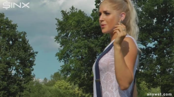 Seductive Blonde Smokes And Gets Drenched In Lake Screencap 7 on sinx.preview.netperv.com